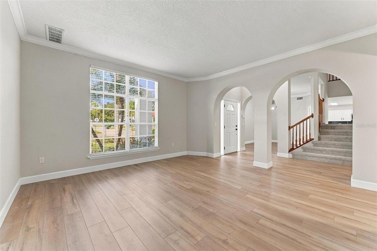 Located right off the front door is the formal living room