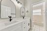 Hall bathroom upstairs with new dual vanity, lighting, mirrors & fixtures