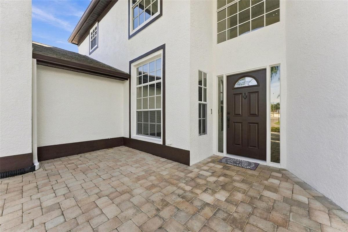 Front porch area is spacious enough for some tables and chairs