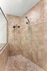 Very large shower with multiple shower heads