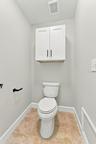 Private water closet in primary bathroom