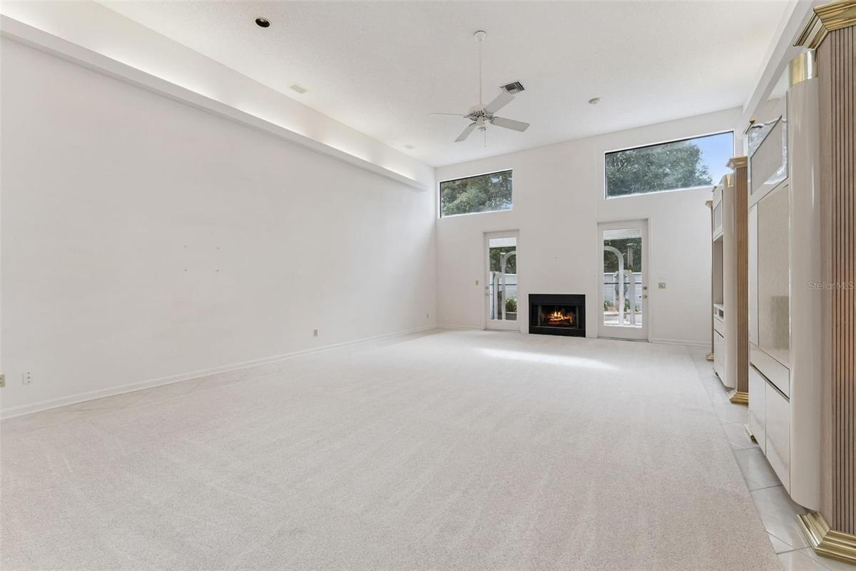 Living and dining room with wood burning fire place