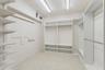Primary room walk in closet