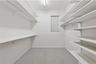 Walk in closet in upstairs 2nd primary suite