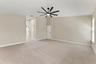 Very large primary bedroom with dual walk in closets