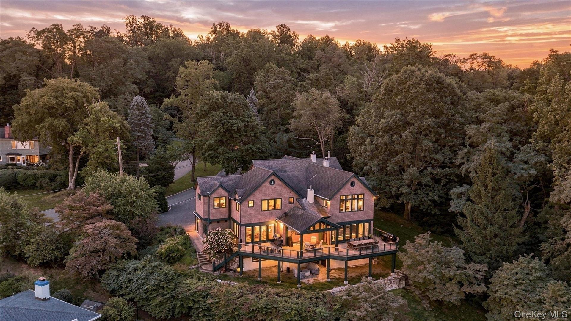A stunning setting overlooking the Hudson River, bordering the historic Old Croton Aqueduct Trail and Rockwood Hall State Park, where natural beauty a