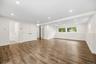 Large family room with full bath, bedroom & slider to covered patio