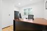 Bedroom / Office Recessed ceiling lighting, wood-finish flooring, white walls, and a window with horizontal blinds