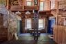 Miscellaneous room with hardwood / wood-style flooring and beamed ceiling