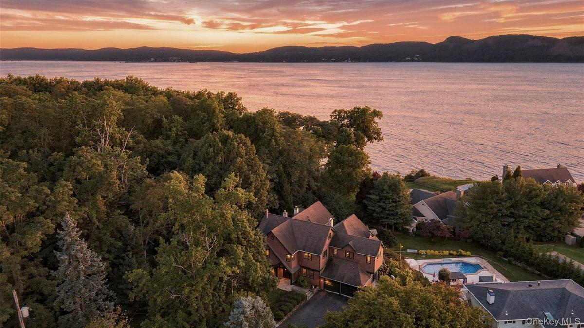 Expansive property featuring a multi-level residence and stunning Hudson River views.