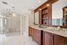 Features radiant-heated marble floors, complemented by a marble shower