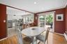 Formal dining room opens to your eat-in kitchen and sliders lead to the large deck.