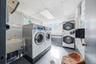 Laundry room is located on the same floor as the Apartment