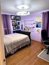 Wood-finish flooring with coordinating wood trim