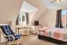 Angled ceiling lines and a neutral color palette