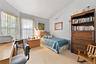 The Well Sized Guest Bedroom Offers Beautiful Vaulted/Volume Ceilings, Large Corner Tri State Windows For Natural Light, A Triple Closet & Ample Room 