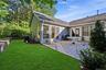 The Very Private Backyard Offers A Large Brick/Paver Patio With PVC Privacy Fencing And  A Stone Wall Accentuates The Mature Landscape & Privacy/Shade