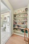 Lovely Custom Built In Bookshelves In The Primary Bedroom.