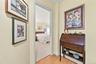 Off Of The Hallway Is The Entrance To The Warm & Inviting, Comfortable Primary Bedroom Suite.