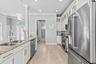 Kitchen to Pantry/Built in Desk/powder Room