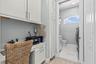 Built in Desk Next to Kitchen.. Leads into half bath/laundry room
