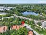 AERIAL VIEW OF TOWNHOME WITH LAKE LILY ACROSS U.S. 17-92