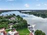 LAKEFRONT AERIAL SHOT WITH COMMUNITY GROUNDS + PRIVATE BOAT SLIPS / DOCK