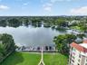 LAKEFRONT AERIAL SHOT WITH COMMUNITY GROUNDS + PRIVATE BOAT SLIPS / DOCK