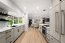 Spacious Kitchen Area w/ Views of Outdoor Entertainment Space