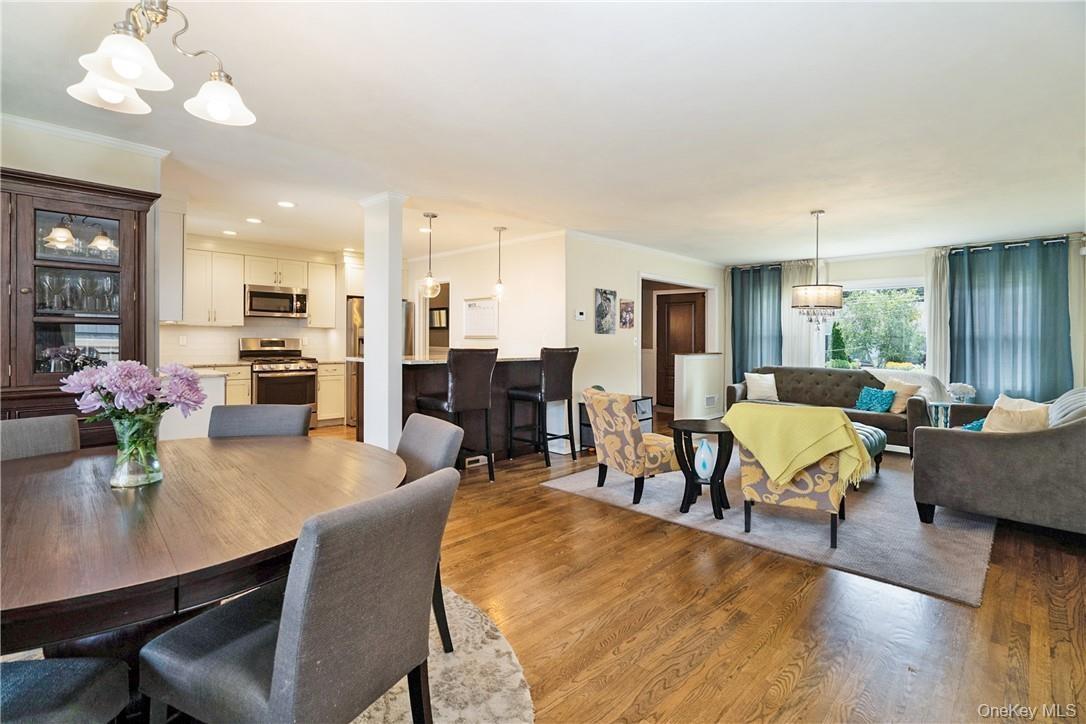 View of the open floor plan with the kitchen, dining and living room.