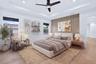 Master Suite-Hardwood Flooring- Tray Ceilings-Bright lighting with window  shades.