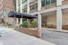 Entrance to property with brick siding