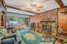 Living Room with Brick Fireplace