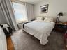 Bedroom featuring wood finished floors