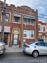 Brick facade with decorative arched entryway