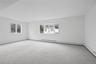 LOWER LEVELMany windows including a large bow make this lower level bright and welcoming!