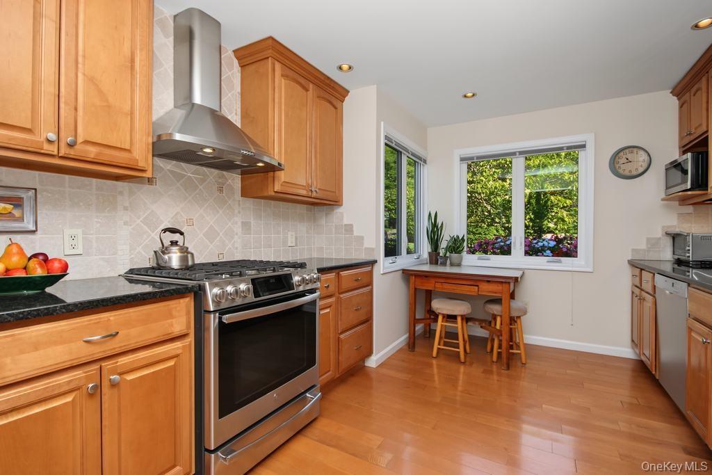 Updated Kitchen featuring hardwood floors