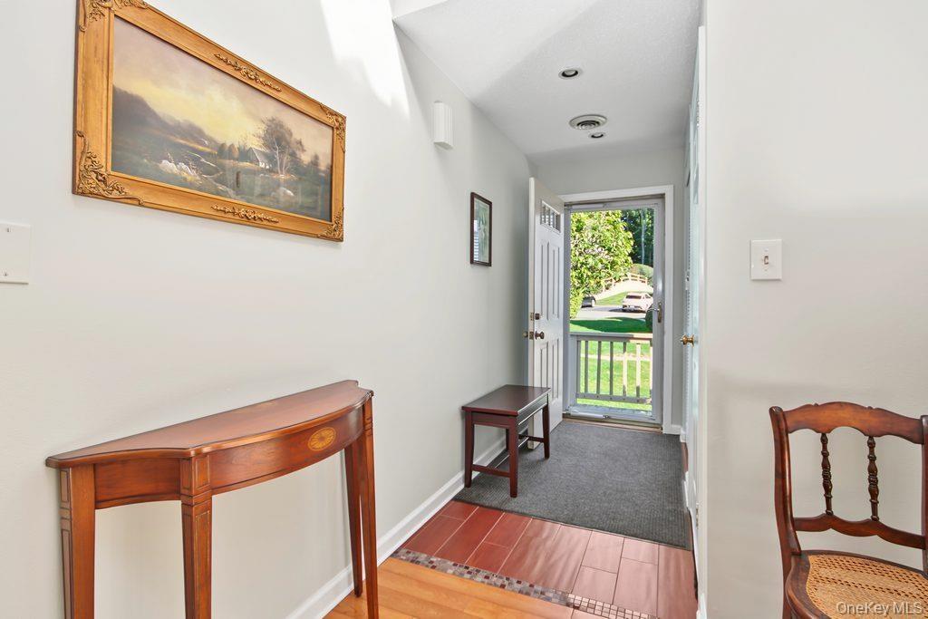 Entry way has tile floor and closet