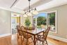Dining area of eat-in kitchen accented by tray ceiling