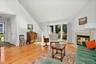 Living room has cathedral ceiling