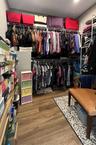 walk-in closet off of primary bedroom