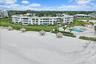 Sands Point, beach, pool and tiki's
