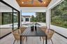Covered lanai with motorized retractable screens