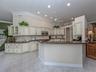 Tastefully refreshed open-concept kitchen designed for everyday living and hosting family and friends.
