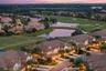 Beautiful lake and golf course surroundings set the scene for relaxed Lakewood Ranch living.