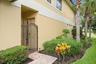 A tucked-away gated entrance adds privacy and a convenient spot for deliveries.
