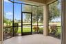 Your spot for morning coffee, fresh air, and peaceful views across the golf course.