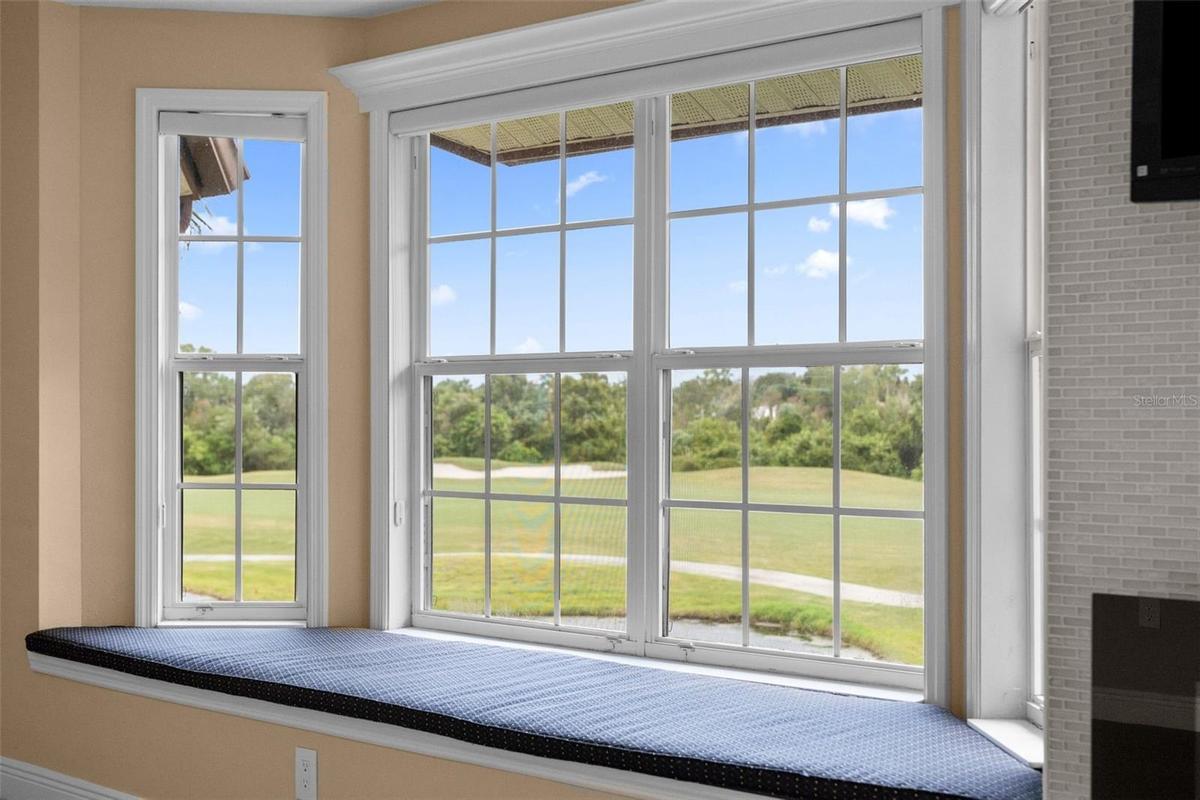 Settle into the window seat with a good book and enjoy the golf course views.