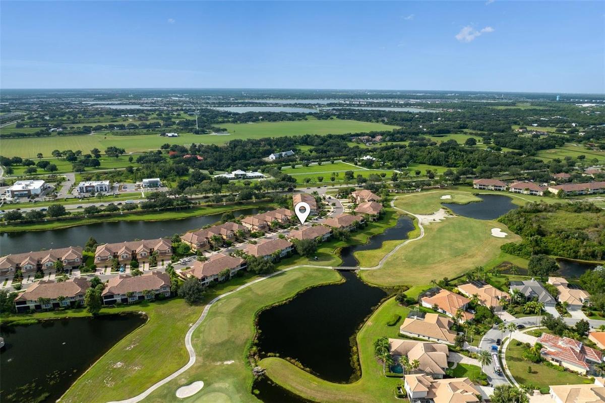 Set along Legacy Golf Course, this home enjoys sweeping fairway and lake views—a beautiful backdrop for morning coffee, quiet evenings, and relaxed Fl