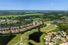 Set along Legacy Golf Course, this home enjoys sweeping fairway and lake views—a beautiful backdrop for morning coffee, quiet evenings, and relaxed Fl
